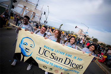 https://www.kindnessinmotionmag.com/wp-content/uploads/2025/03/mlk-parade-2020.jpg