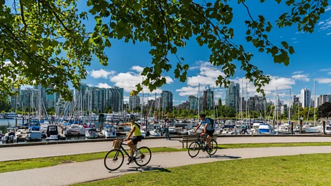 Alamy Stock Photo Cities like Vancouver, whose design and building policies accommodate nearby natural greenery, are often surveyed as popular places to live. (Credit: Alamy Stock Photo)